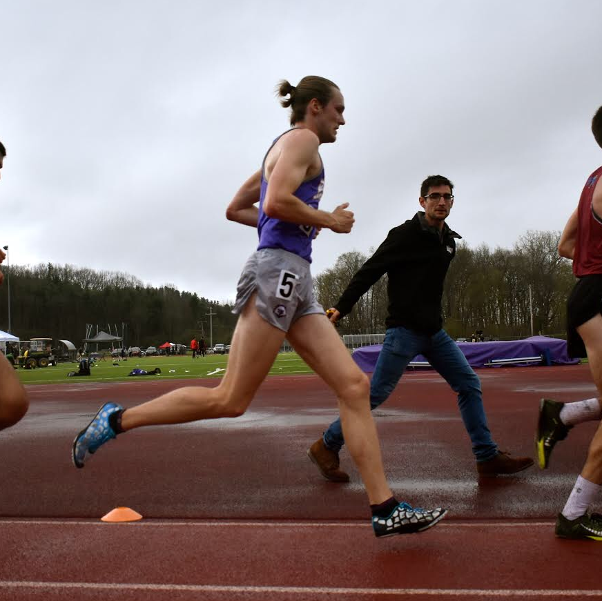 Dr. Mike running a track race.