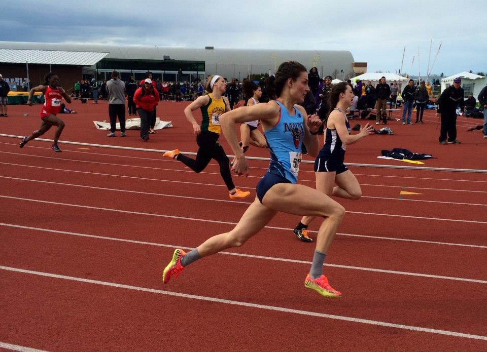 Dr. Ashten sprinting at the America East Conference Championships in 2014.