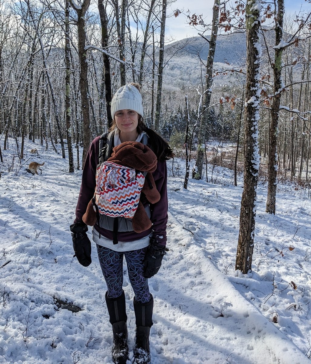 Dr. Ashten hiking with her son, Calix.